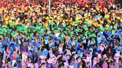 Human solidarity rainbow flag on the oval at Poly Prep